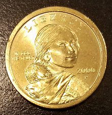 A coin with a woman's face on it.