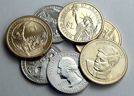 A group of coins with the image of the united states of america.